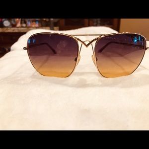 Roberto Cavalli gold frames, purple and gold lenses